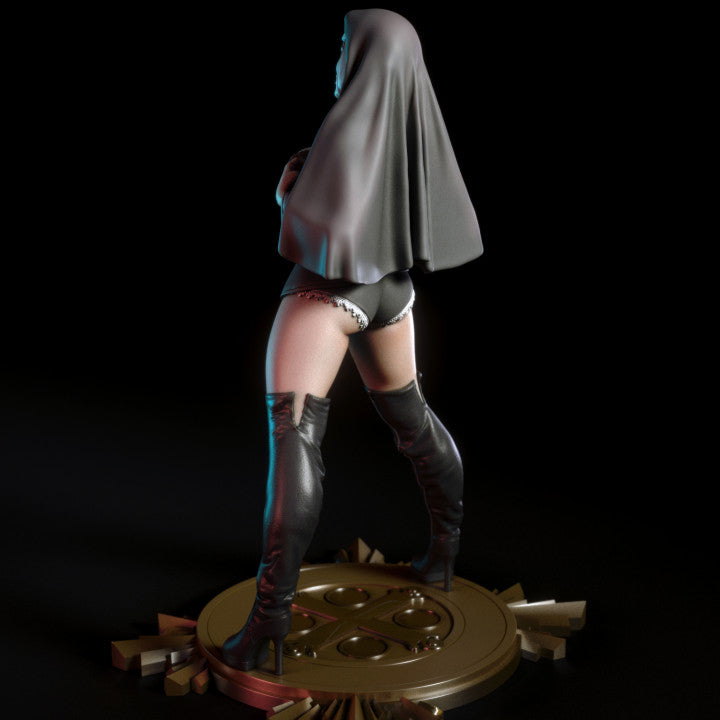 Statue of a figure in a hooded cloak and boots on a dark background