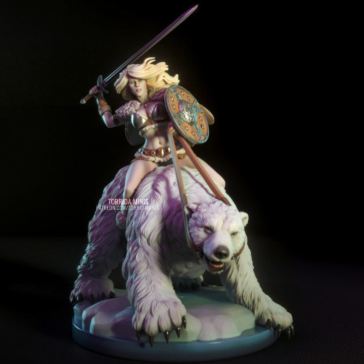 Solid resin fantasy warrior woman posed atop polar beast, sword raised and cloak billowing. Highly detailed fur, shield, and armour textures. Designed for premium display or custom painting.