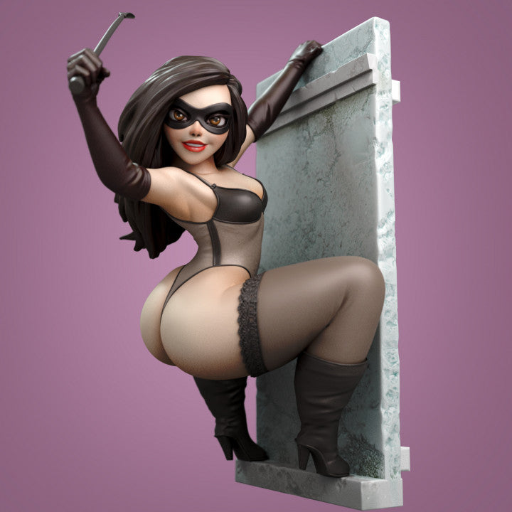 Stylised resin cat burglar miniature posed mid-climb on a marble-effect wall, mask and whip in hand, dark bodysuit and long boots. Boutique art figure ideal for display or miniature painting.