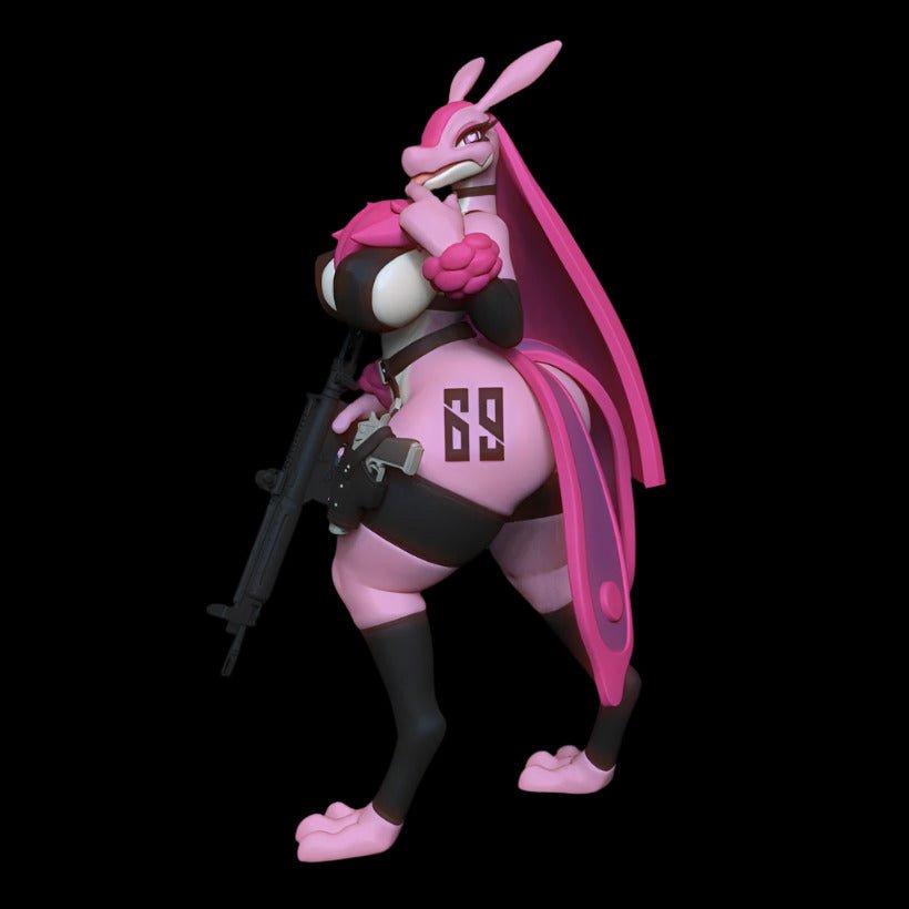Bold anthro bunny resin figure in tactical gear, posed confidently with one hand on her hip and the other resting near a detailed rifle. Sculpt features stylised musculature, cheeky “69” marking on the thigh, and a dramatic two-tone pink cape.