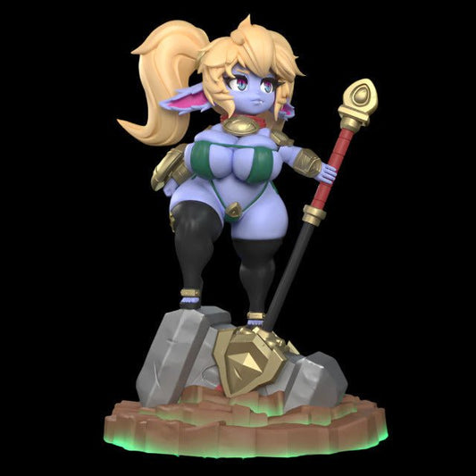 Fantasy warrioress resin figure posed atop rocky terrain, gripping a golden staff. Features a curvy build, battle-ready armour accents, and vibrant purple skin with long ponytail.
