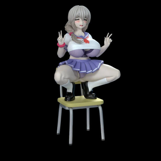 Resin pinup figure of a squatting schoolgirl posed on a yellow chair, hands raised in peace signs. Includes exaggerated anatomy, lifted top revealing purple bra, short pleated skirt, and black shoes.